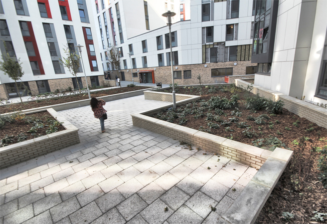 Photo of woman in courtyard at Mayflower Halls, student accommodation, in Southampton